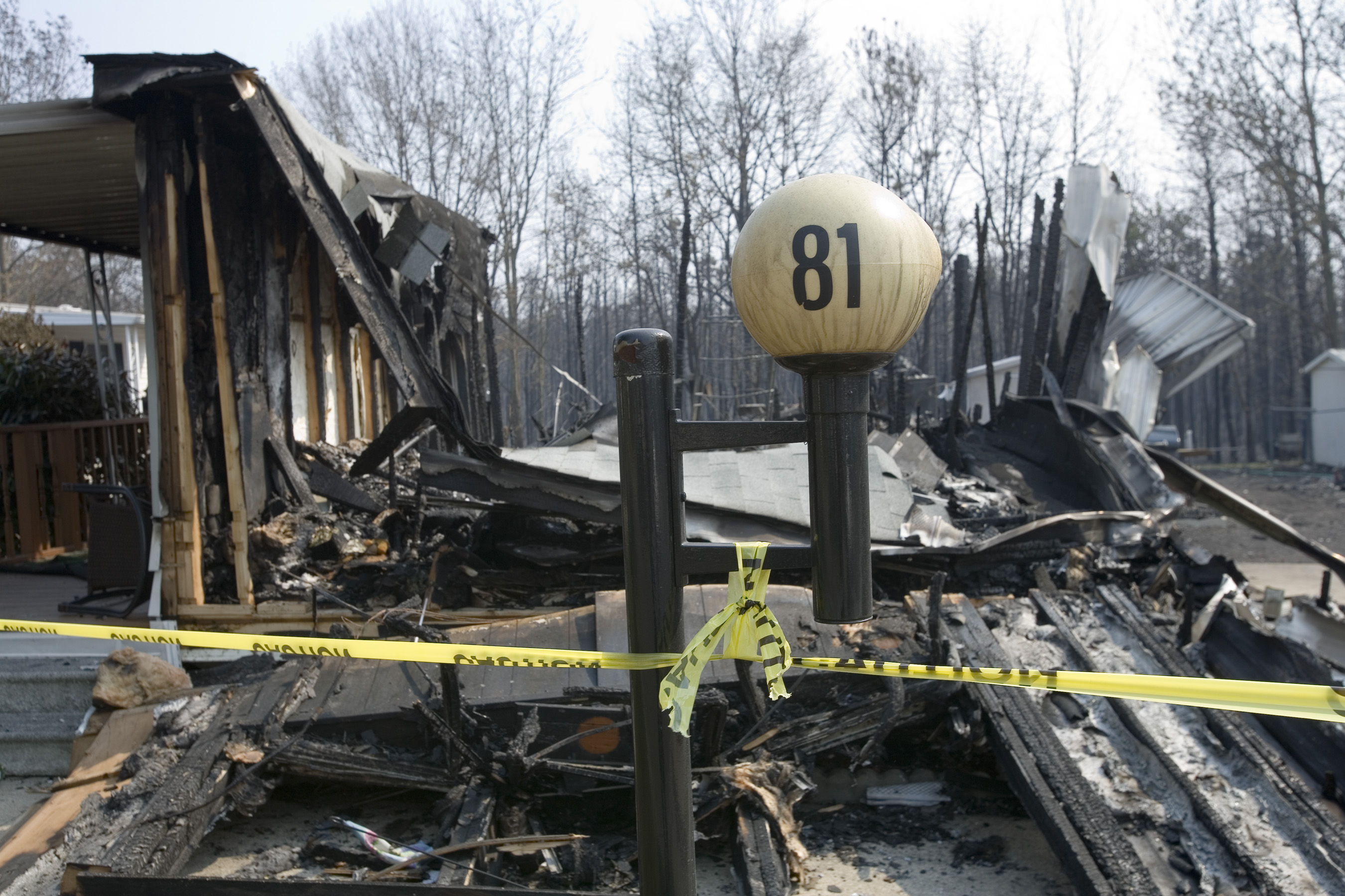Representative FEMA fire-loss exterior showing the kind of structural damage that requires immediate board-up, scope separation, and reconstruction planning.