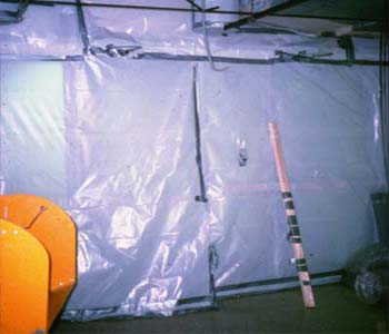 EPA cleanup image showing full containment on a larger remediation job before selective demolition and cleaning proceed.