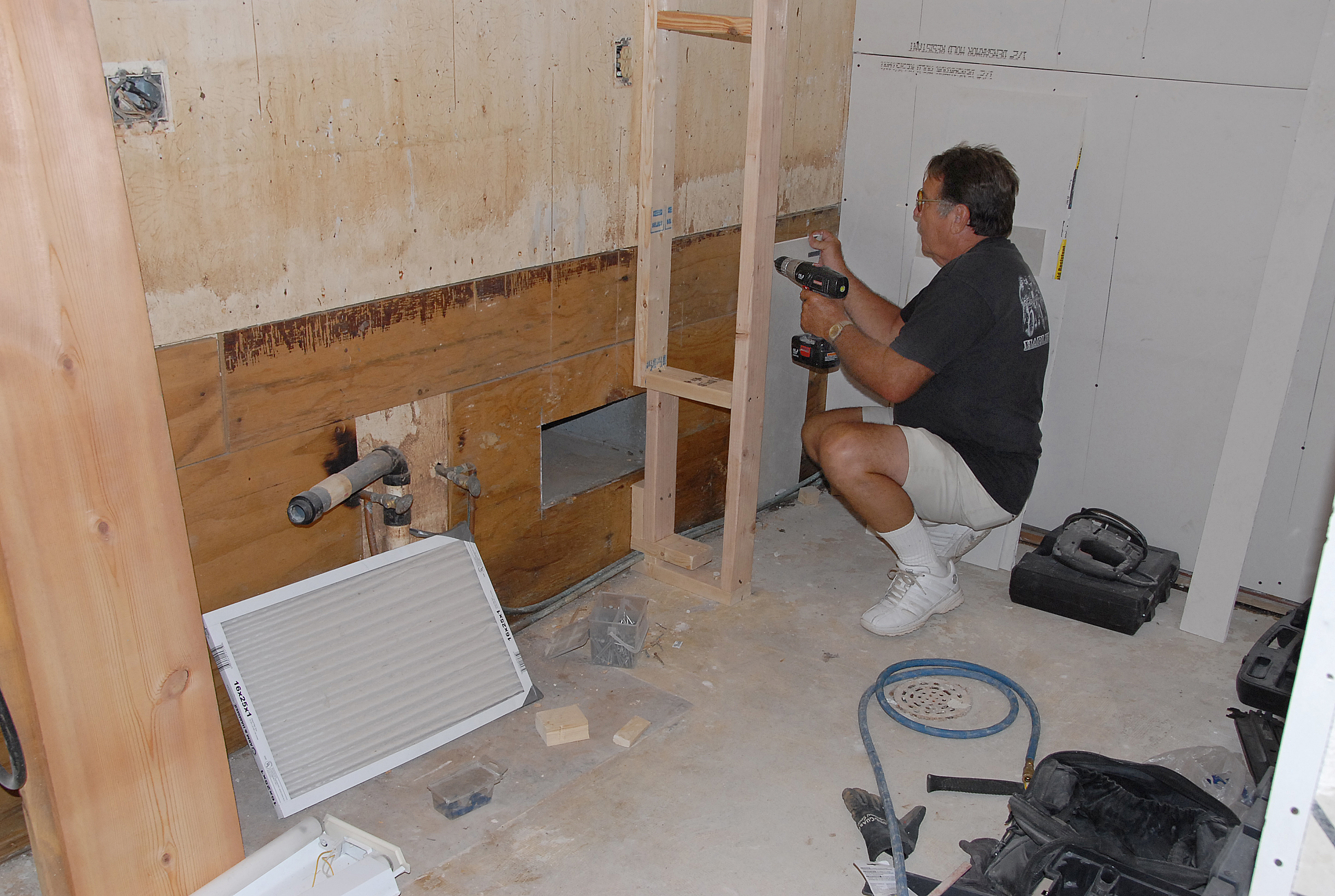 Representative FEMA recovery image showing structural dry-out progress and rebuild-prep work after damaged materials are removed.